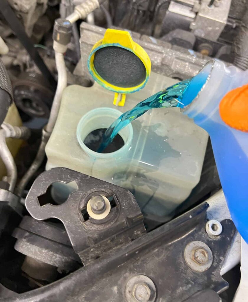 POURING WASHER FLUID